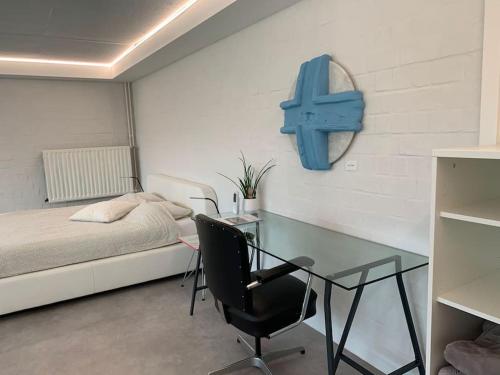 En eller flere senge i et værelse på PARK Loft @ BRUGES with private (free) parking