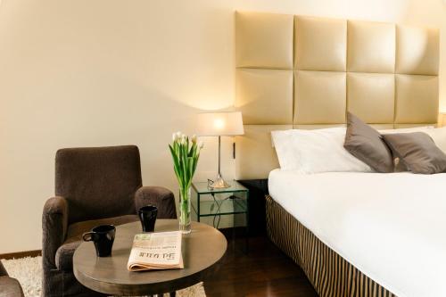 Cama ou camas em um quarto em Cosmopolitan Hotel