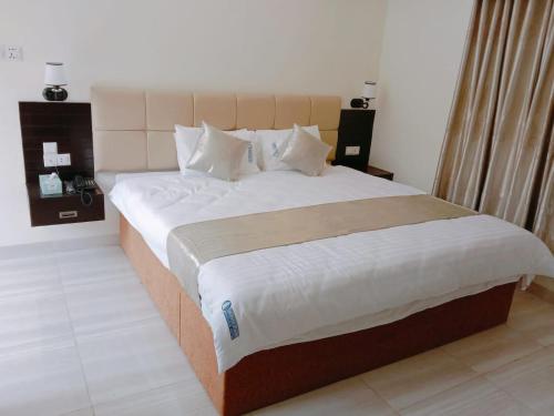 Katil atau katil-katil dalam bilik di White Park Boutique Hotel