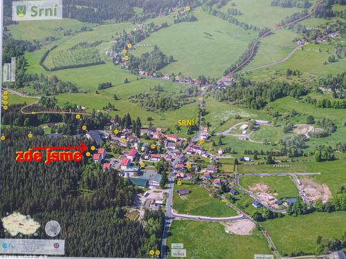 an aerial view of a small village in a mountain at Apartmán v Srní in Srní