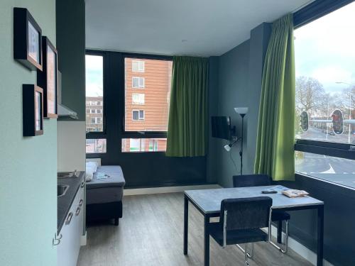 Televizors / izklaižu centrs naktsmītnē Short Stay Wageningen