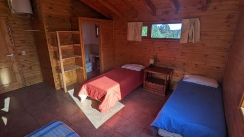 Una cama o camas en una habitación de Lo De Pablo