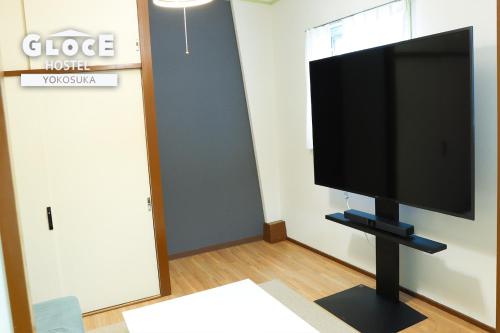 TV i/ili zabavni centar u objektu GLOCE 横須賀 シェアルーム NAVY BASE l Yokosuka Share room at NAVY BASE