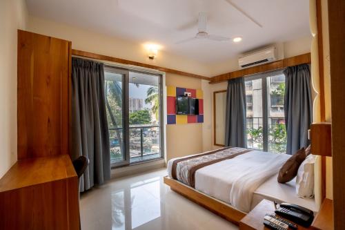 Krevet ili kreveti u jedinici u objektu Home2 Suites and Service Apartments, Mumbai Airport