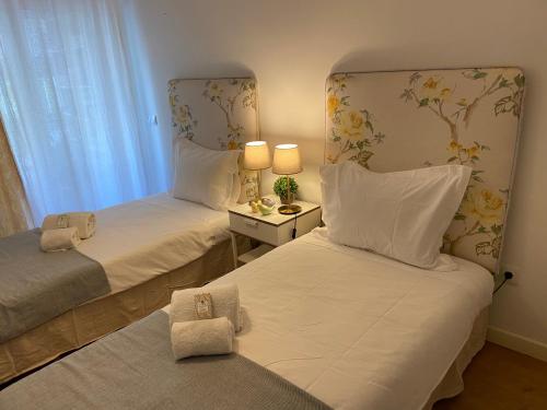 Lova arba lovos apgyvendinimo įstaigoje Cosy Avenida Apartment