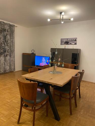 Televisor o centre d'entreteniment de Ferienwohnung Villa Fortuna