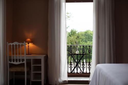 A bed or beds in a room at POSADA SEMILLA