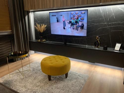 Televisor o centre d'entreteniment de Luxury Apartament Wyszyńskiego