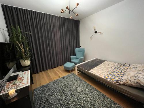 Vuode tai vuoteita majoituspaikassa Przytulny Apartament w Centrum