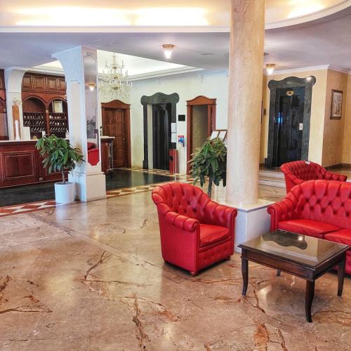 A seating area at Mariano IV Palace Hotel