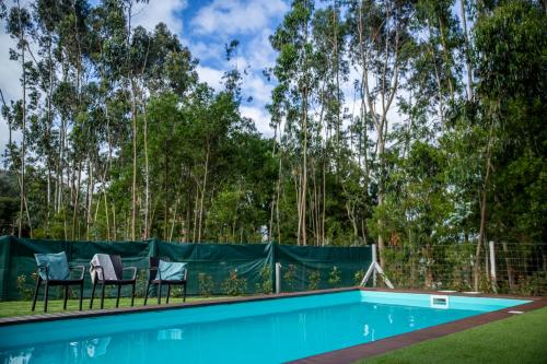 Kolam renang di atau dekat dengan Villa Rencanto – um espaço com a sua assinatura