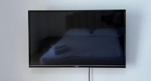 TV in/ali zabaviščno središče v nastanitvi Hotel Nino