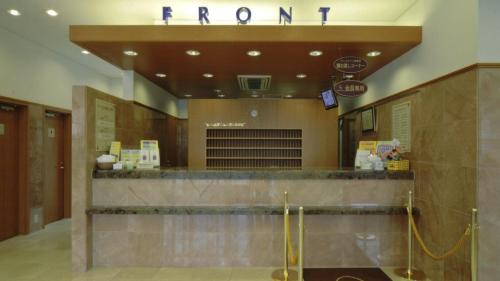 a front counter of a store in a building at Toyoko Inn Wako-shi Ekimae in Wako