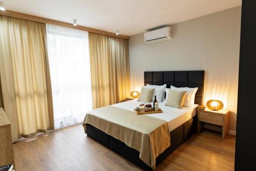 Burgas Beach Resort 2 Apartments房間的床