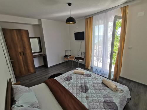 Voodi või voodid majutusasutuse GOPO Guesthouse Elshani toas