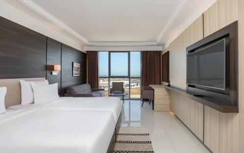 Μια τηλεόραση ή/και κέντρο ψυχαγωγίας στο Radisson Hotel Sfax