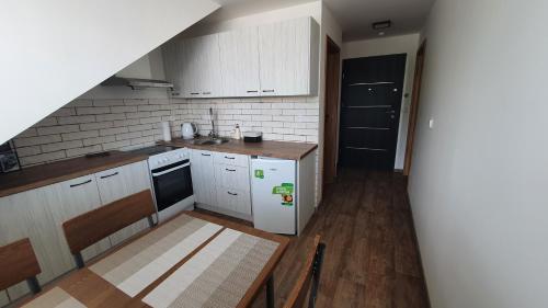 Una cocina o kitchenette en V Jeseníku