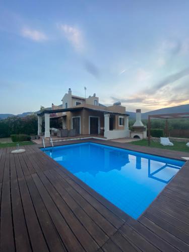 The swimming pool at or close to Georges Villa Galaxidi, family, pool and garden