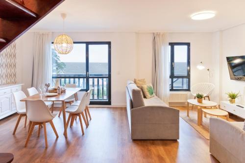 A seating area at Abba Comillas Apartments