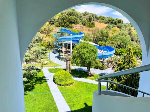 a view of the pool from the balcony of a resort at Club Beyy Resort Hotel - Ultra All Inclusive in Izmir