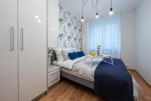 Krevet ili kreveti u jedinici u objektu Apartment BlueBird Katowice near Spodek MCK & City Center