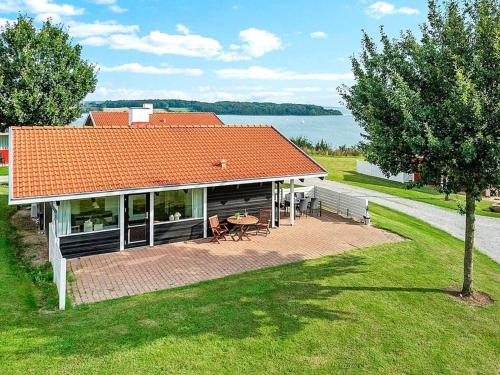 een uitzicht op een huis met een oranje dak bij Holiday home Aabenraa LIX in Aabenraa