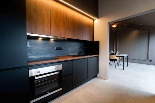 Una cocina o kitchenette en Luxury Penthouse & Terrace - Mons City Center