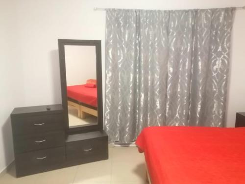 Katil atau katil-katil dalam bilik di hermosa casa en coto privado especial para ti y tu familia