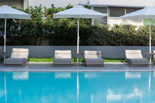 The swimming pool at or close to Oktober Downtown Boutique Hotel