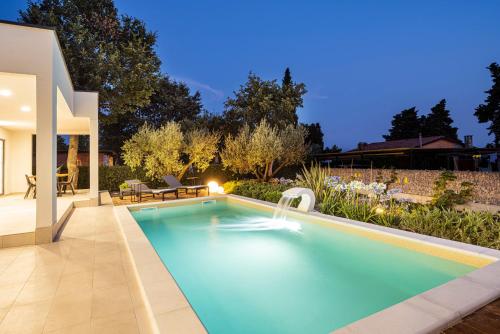 Swimmingpoolen hos eller tæt på GOLDIMARE GARDEN RESIDENCE