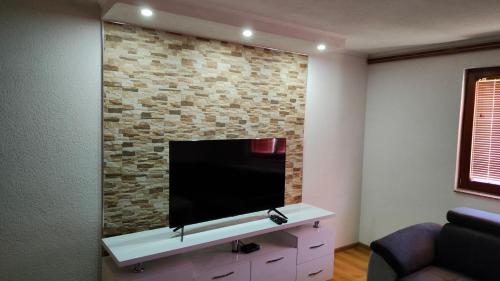 A television and/or entertainment centre at ENSA Apartments