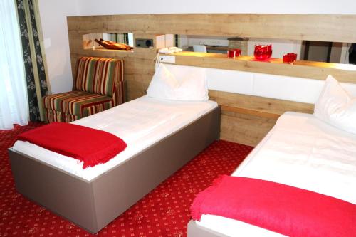 Cama ou camas em um quarto em Hotel Weidenhof