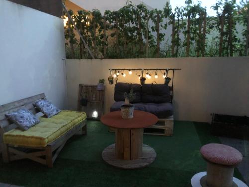 Кът за сядане в Appartement avec terrasse proche de Rennes