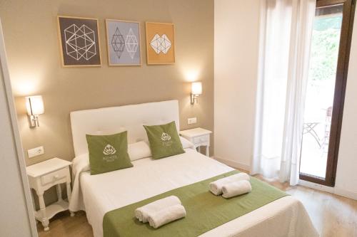 A bed or beds in a room at Eco Hotel Toledo