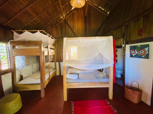 Ein Bett oder Betten in einem Zimmer der Unterkunft Tamarin Lodge