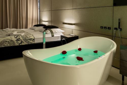 Katil atau katil-katil dalam bilik di Apartament z jacuzzi City Life Centrum