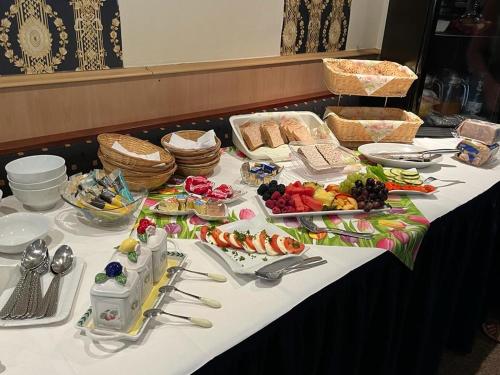 a table with a buffet of food on it at Hotel zur Altstadt in Celle