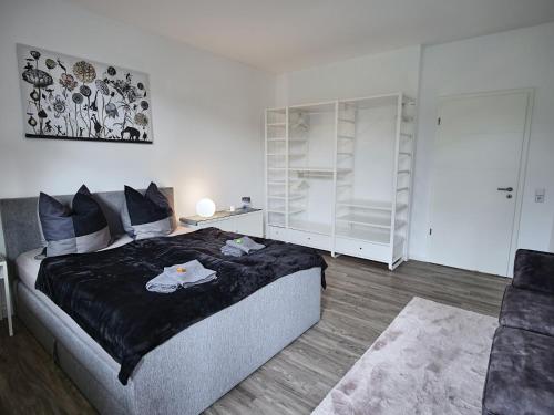 Säng eller sängar i ett rum på Appartement OTTO I - Erfurt Zentrum