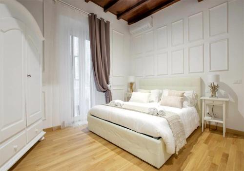 Cama ou camas em um quarto em Navona Love Apartment