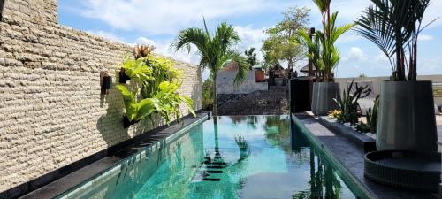 Poolen vid eller i närheten av Villa Mimpi Bali