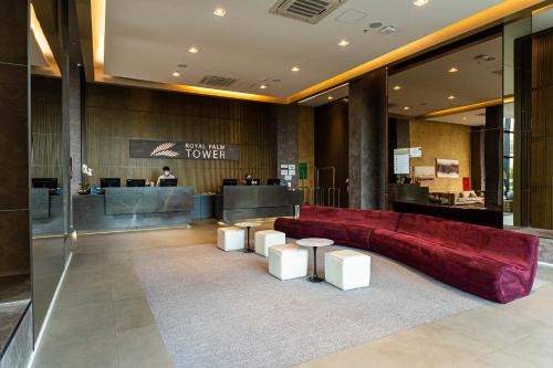 A seating area at Royal Palm Tower Anhanguera