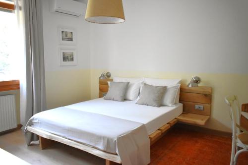 Una cama o camas en una habitación de CividaleMia, casa vacanza