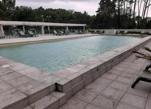 A piscina em ou perto de Apto en Punta del Este con Piscina Climatizada!!