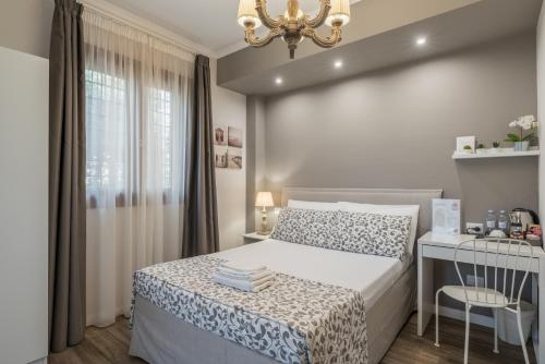 Krevet ili kreveti u jedinici u objektu B&B L'Ulivo Fiumicino