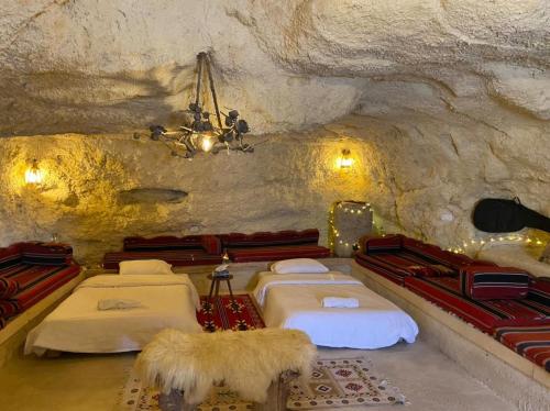 Postelja oz. postelje v sobi nastanitve 7 Caves Hotel