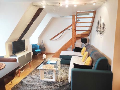 Appartement Saint Malo vue sur mer et sur intra muros, Ferry, plage et commerces à 50 m में टेलीविजन और/या मनोरंजन केंद्र