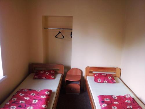 Cama ou camas em um quarto em Fortuna Hostel