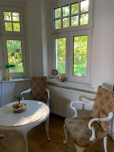 Un lugar para sentarse en 100 qm Ferienwohnung Am Heiligen Brunnen