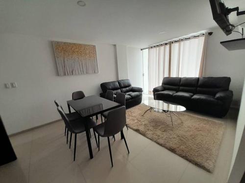 Гостиная зона в Elegante departamento en Urbarí - Cond. Aruma