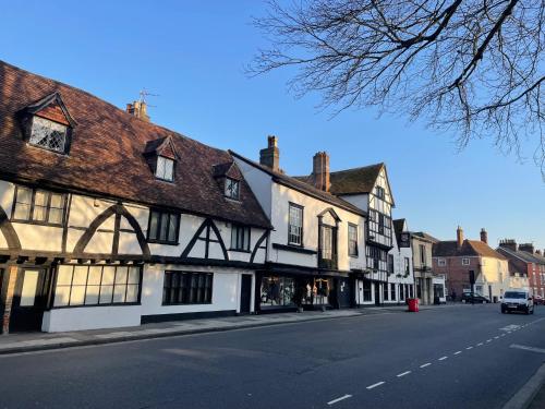 an old building on the side of a street at Chapter House in Salisbury